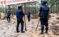 Ukraina: w Iziumie ekshumowano 59 ciał