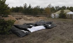 Ukraińska policja: 146 ciał ekshumowano ze zbiorowego grobu w Łymanie