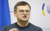 Szef ukraińskiego MSZ: zbrodniarz wojenny Putin 